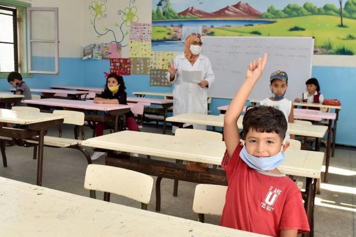 Students attend the first day of classes in the Moroccan city of Sale amid measures imposed by authorities in a bid to stem the spread of Covid-19