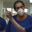 AFPTV filmed doctors like Jaques Sztajnbok (C) in Sao Paulo and other medical workers around the world in action as they battled coronavirus at work and at home