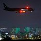 A cargo plane operated by Etihad Airways carrying medical aid to help Palestinians cope with the coronavirus pandemic  prepares to land at Israel's Ben Gurion Airport near Tel Aviv on June 9, 2020