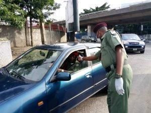 Hand washing and sanitising at the entrance of Bonny Army Cantonment in Lagos. [NAN]