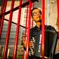 Kacey Wong's performance art involved playing China's national anthem as he sat in a cage