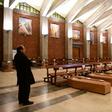 At one point, dozens of coffins were laid out in the church as the death toll in the region soared