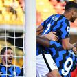 Romelu Lukaku (C) celebrates with Achraf Hakimi (C) and Arturo Vidal (R) after scoring after 30 seconds against Benevento.