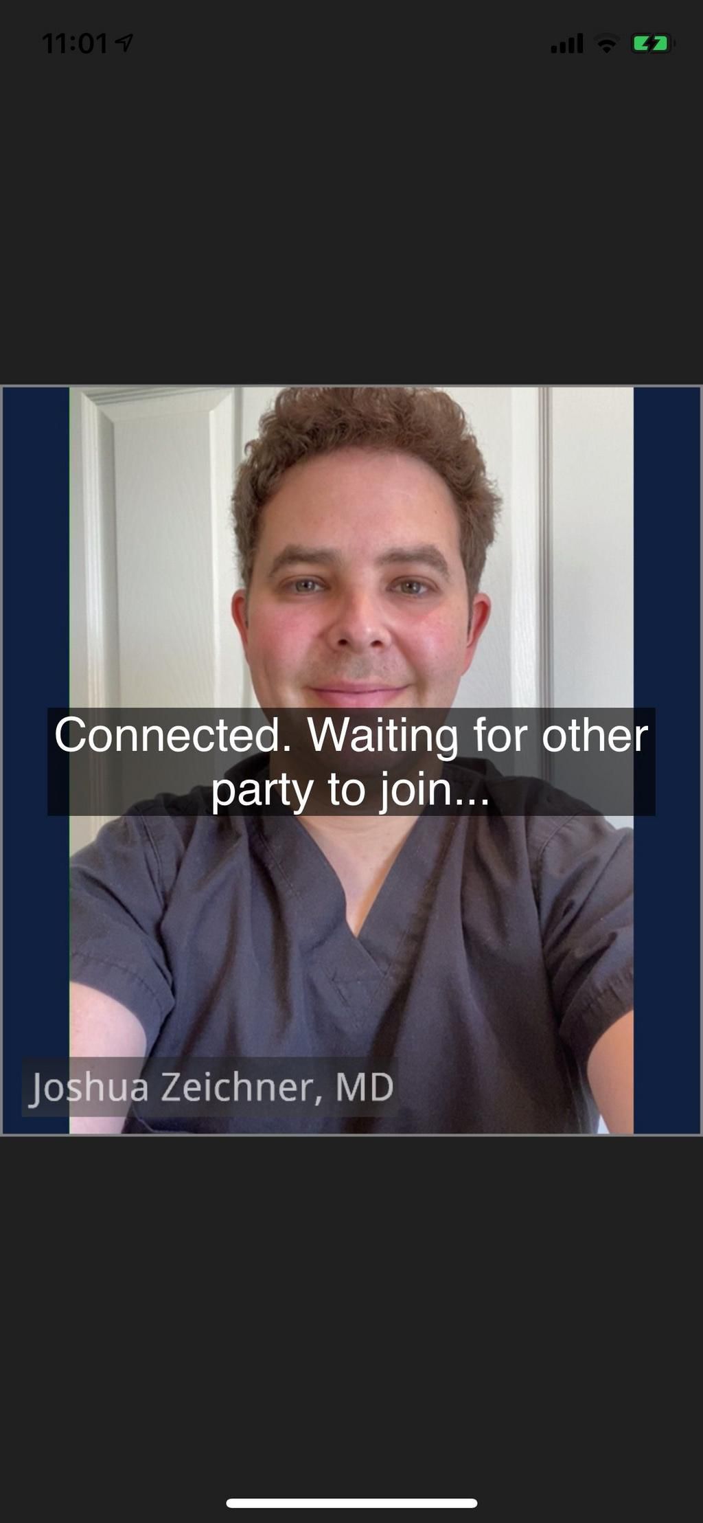 Dr. Zeichner waiting for a patient to join a virtual visit.