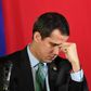 Venezuelan opposition leader and self-proclaimed acting president Juan Guaido gestures during a National Assembly session at the San Antonio municipal theatre south of Caracas in February