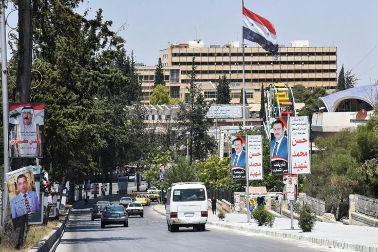 Syrians head to the polls Sunday to elect a new parliament as the war-torn country faces a crumbling economy and international sanctions