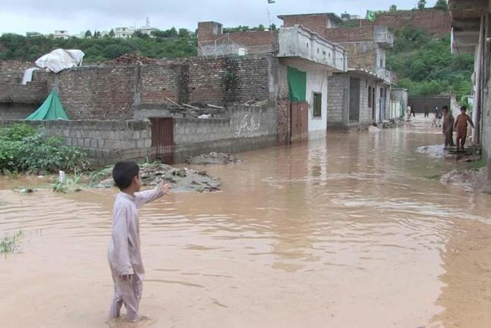 Water submerged streets and washed into houses in Rawalpindi city, next to the capital, after heavy rain caused rivers to overflow. Large swathes of Pakistan have been hit by flooding in recent weeks