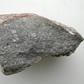 A piece of the meteorite Sahara 97096 (about 10 cm long), an enstatite chondrite