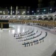 A limited number of worshippers perform prayers at the Kaaba, Islam's holiest shrine, in the Grand Mosque complex in Saudi Arabia's holy city of Mecca