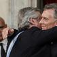 Outgoing president Mauricio Macri embraces his leftist rival and new Argentine President Alberto Fernandez at the inauguration in Buenos Aires on December 10, 2019