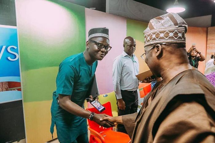 Babajide Fadoju with his late boss Abiola Ajimobi