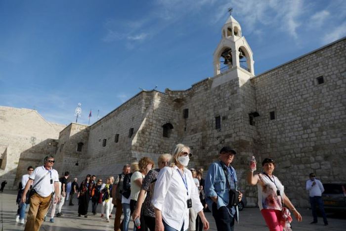 Crowds were eager to enter as the Church of the Nativity reopened n Bethlehem