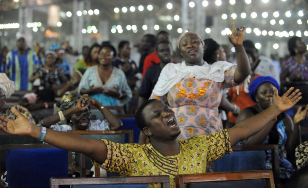 A service at a Pentecostal church on New Year's Day in Lagos, Nigeria, in 2014 [PIUS UTOMI EKPEI/AFP/Getty Images]