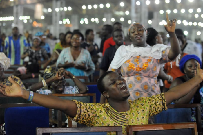 A service at a Pentecostal church on New Year's Day in Lagos, Nigeria, in 2014 [PIUS UTOMI EKPEI/AFP/Getty Images]
