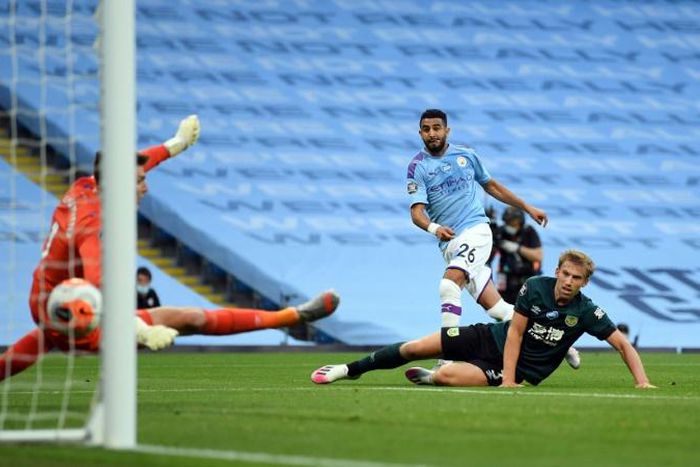 Riyah Mahrez (centre) scores his first goal in Manchester City's thrashing of Burnley