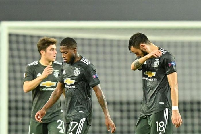 Down and out: Manchester United lost a third semi-final this season in a 2-1 defeat to Sevilla