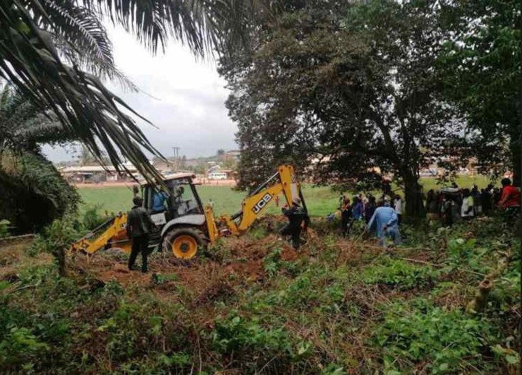 Families storm cemetery to pick exhumed corpses of relatives