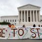 Pro-immigration activists in front of the US Supreme Court after the court upheld the DACA "Dreamers" program offering legal protections to some 700,000 people brought into the country illegally as children