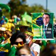 A supporter brandishes a banner showing Brazilian Jair Bolsonaro, who has repeatedly evoked the threat of a "coup"