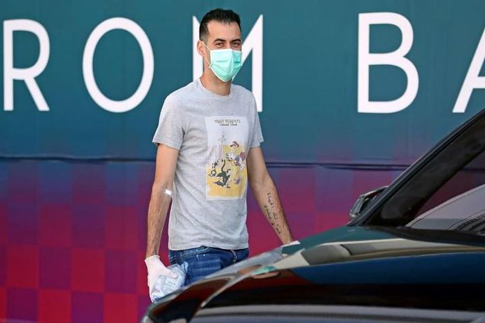 Barcelona's Sergio Busquets wearing a face mask and gloves on arrival at the club's training ground last week