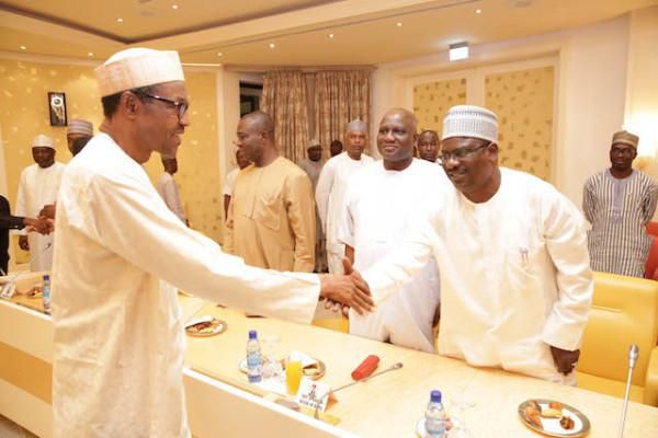 President Muhammadu Buhari exchanging handshake with Senator Mohammed Ali Ndume [Ndume.net]