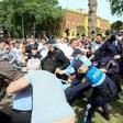 Dozens of opposition supporters, activists and actors battled with police as they tried to break through a security cordon