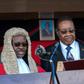 President Peter Mutharika (shown being sworn in May 28, 2019 by Chief Justice Andrew Nyirenda, L) is appealing after the Constitutional Court annulled the election and ordered a re-run, citing 'grave' and 'widespread' irregularities