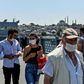 People wear protective face masks to curb the spread of the novel coronavirus (COVID-19) in Istanbul on July 1, 2020 -- concerns are growing in the country as the daily infection toll increases