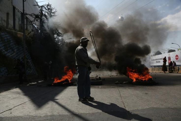 A supporter of Bolivian ex-president Evo Morales is seen protesting at a blockade in El Alto on August 10, 2020