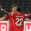 Bayern Munich striker Robert Lewandowski celebrates his long-range goal in the German Cup final win over Bayer Leverkusen on Saturday in Berlin.