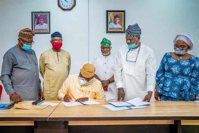 Governor Kayode Fayemi signs revised Appropriation Bill of N91.128bn into law. [Twitter/@kfayemi]