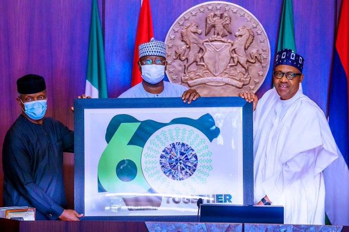From Left: The Secretary to the Government of the Federation, Boss Mustapha, Vice President, Prof Yemi Osinbajo and President Muhammadu Buhari unveiling the logo for the 60th  Independence Anniversary. (Blueprint Newspaper)