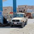Yemeni pro-government fighters gather at a petrol station on April 10 in the coastal town of Shihr, in the southern Hadramawt province where the country's first case of coronavirus was reported
