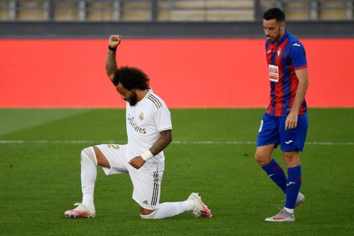 Real Madrid's Brazilian defender Marcelo knelt on the field to celebrate his goal against Eibar on Sunday.