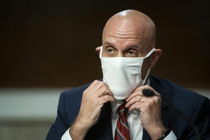 FDA Commissioner Stephen Hahn has drawn criticism that he is giving in to pressure from President Donald Trump as the US struggles against the pandemic
