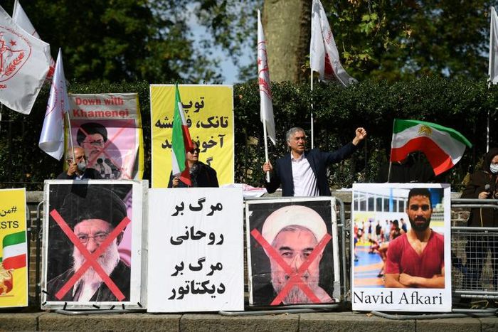 Protesters demonstrate outside the Iranian embassy in London on September 12, 2020 against the execution of Iranian wrestler Navid Afkari in the southern Iranian city of Shiraz and against the Iranian government