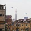 Egyptian air force Apache attack helicopters fly over Cairo on June 2, 2018, as Egyptian President Abdel-Fattah al-Sisi is sworn in for a second four-year term