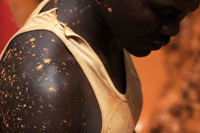A man working in a gold mine is pictured in 2009 in Chudja, near Bunia, north eastern Congo. An abandoned mine in southeastern Democratic Republic of Congo has collapsed killing eight members of one family including five children, a local government of...