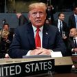 In this July 11, 2018, photo, U.S. President Donald Trump takes his seat as he attends the multilateral meeting of the North Atlantic Council in Brussels, Belgium.