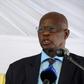 Zimbabwe's ruling party spokesman Patrick Chinamasa, seen here in 2017, has called the US ambassador a "thug" and alleged a plot to back protesters