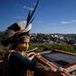 Angoho, an indigenous woman of the Pataxo Ha-ha-hae community, wears a face mask at the Vila Vitoria favela on the outskirts of Belo Horizonte, Brazil