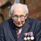 Captain Tom Moore had already become a global phenomenon for raising more than £28 million ($35 million, 32 million euros) for staff of the state-run National Health Service (NHS) battling the coronavirus outbreak