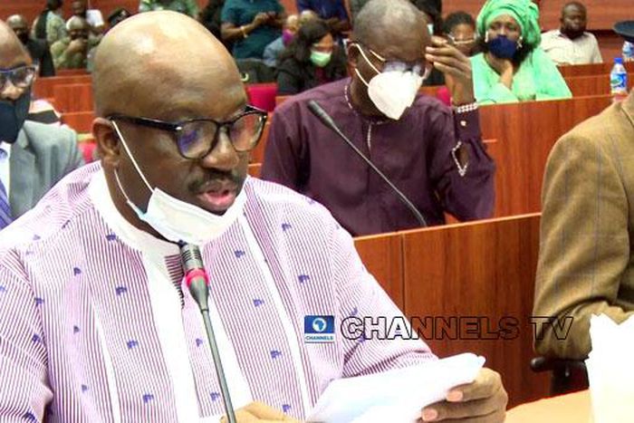 In this photo taken on July 14, 2020, acting Managing Director of the NDDC, Professor Kemebradikumo Pondei, reads from a paper during the agency’s 2019 budget defence at the National Assembly in Abuja. [channelstv]