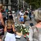 Relatives of the 16 dead laid white carnations on Barcelona's Las Ramblas boulevard where on August 17, 2017 a van mowed down pedestrians leaving behind a trail of bodies