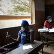 Electoral officials wore masks and gloves as a preventive measure against the spread of the coronavirus during Mali's parliamentary elections