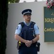 A police officer stands guard outside the Al Noor mosque ahead of the first anniversary of the Christchurch mosque shootings in Christchurch in March 2020