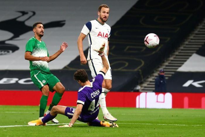 Harry Kane completed his hat-trick with a chip over Maccabi Haifa goalkeeper Josh Cohen as Tottenham won 7-2 in the Europa League