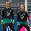 Bayern Munich star Manuel Neuer (L) will go head-to-head with Barcelona shot-stopper Marc-Andre Ter Stegen in Friday's clash of the Germany goalkeepers.