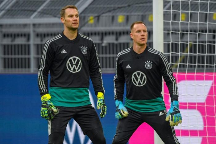 Bayern Munich star Manuel Neuer (L) will go head-to-head with Barcelona shot-stopper Marc-Andre Ter Stegen in Friday's clash of the Germany goalkeepers.