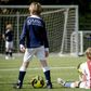 Dutch children play football during the first reopening day of youth training camps in the Netherlands after the coronavirus covid-19 outbreak in The Hague, on April 29, 2020